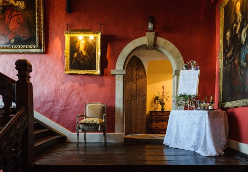 Elmore Court red wall, doorway and painting